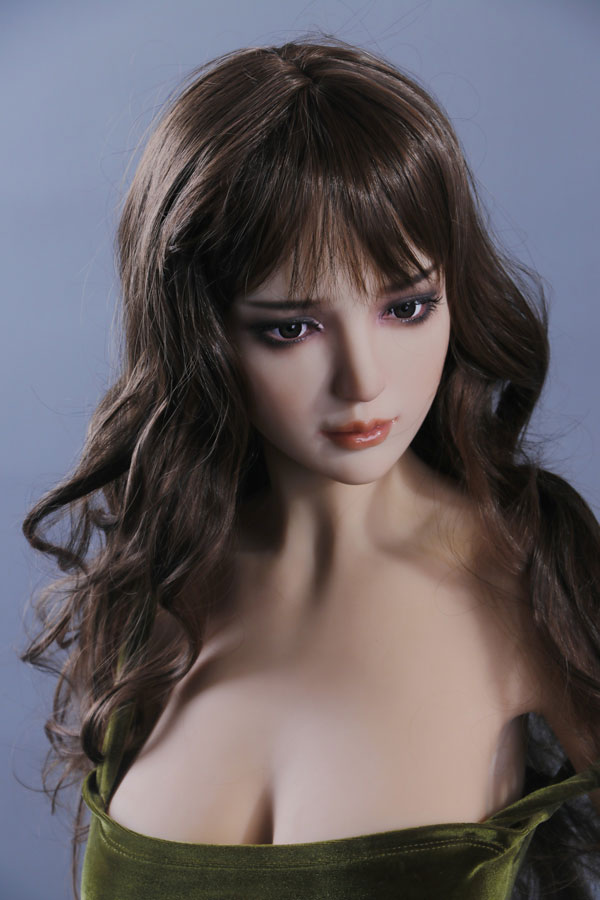 cheveux bouclés gros seins silicone doll